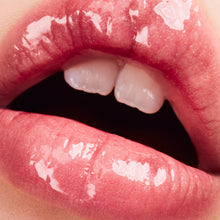 Load image into Gallery viewer, Fenty beauty Gloss Bomb Universal Lip Luminizer Color: FU$$Y - shimmering pink