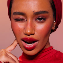 Load image into Gallery viewer, Huda Beauty Cheeky Tint Cream Blush Stick Shade” Rebel Red”
